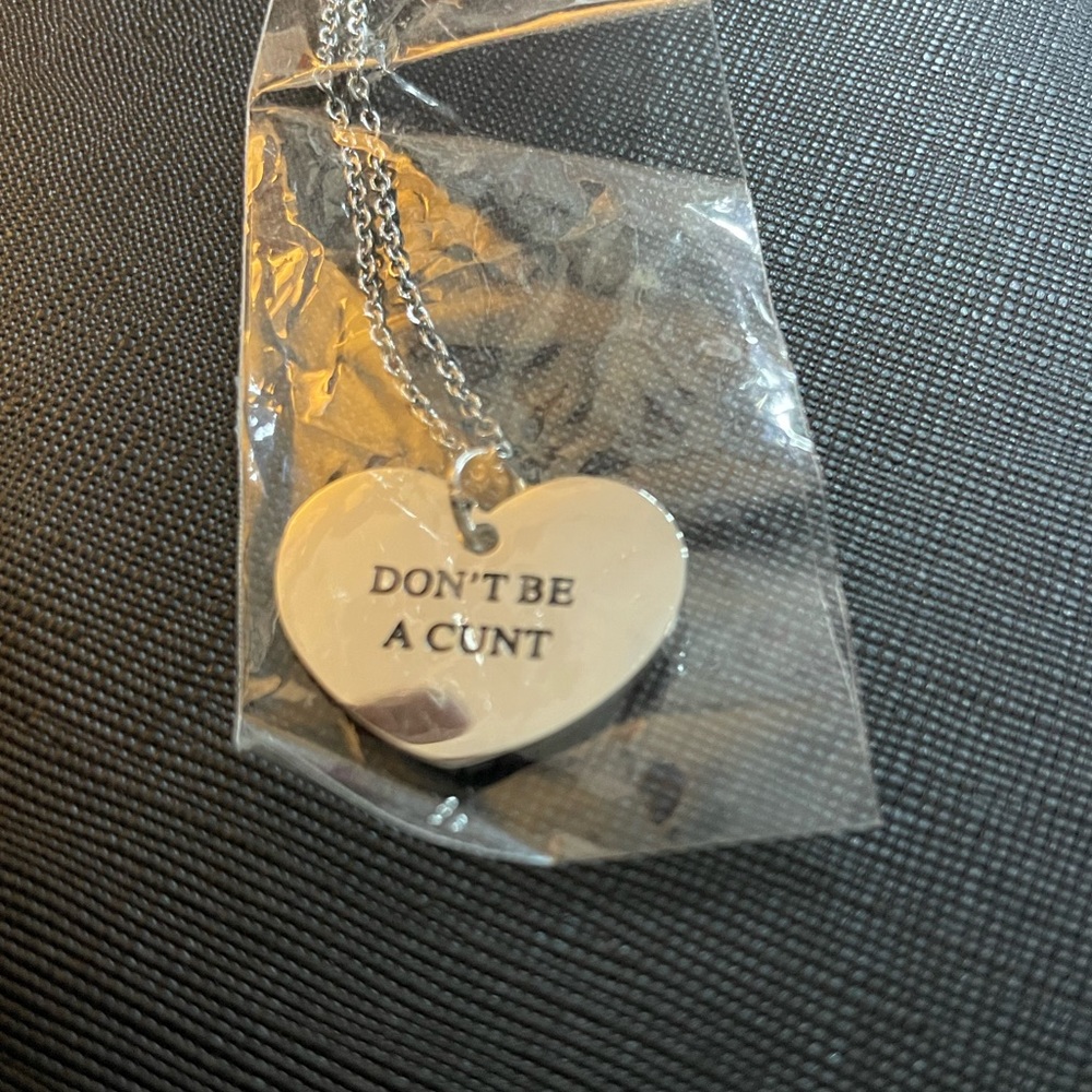 Metal Marvels heart shaped “don’t be a c*nt” silver necklace. 20in